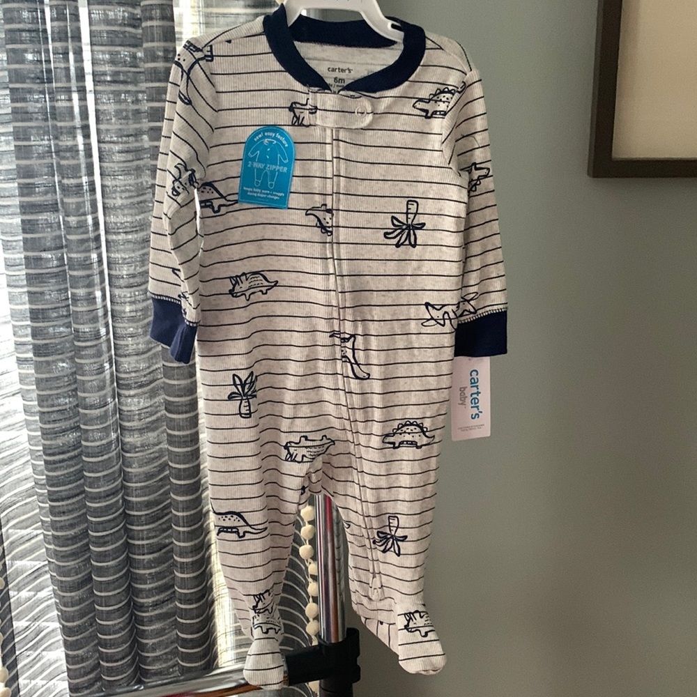 Carter’s 6-month sleep and play onesie.